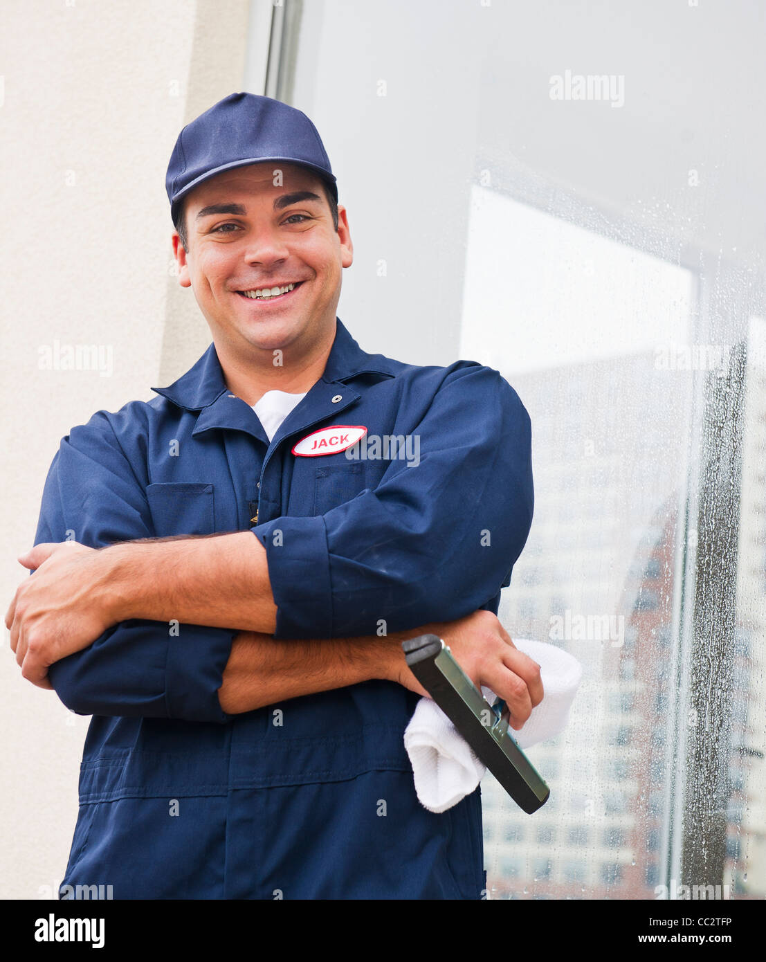 USA, New Jersey, Jersey City, Man cleaning window Stock Photo Alamy