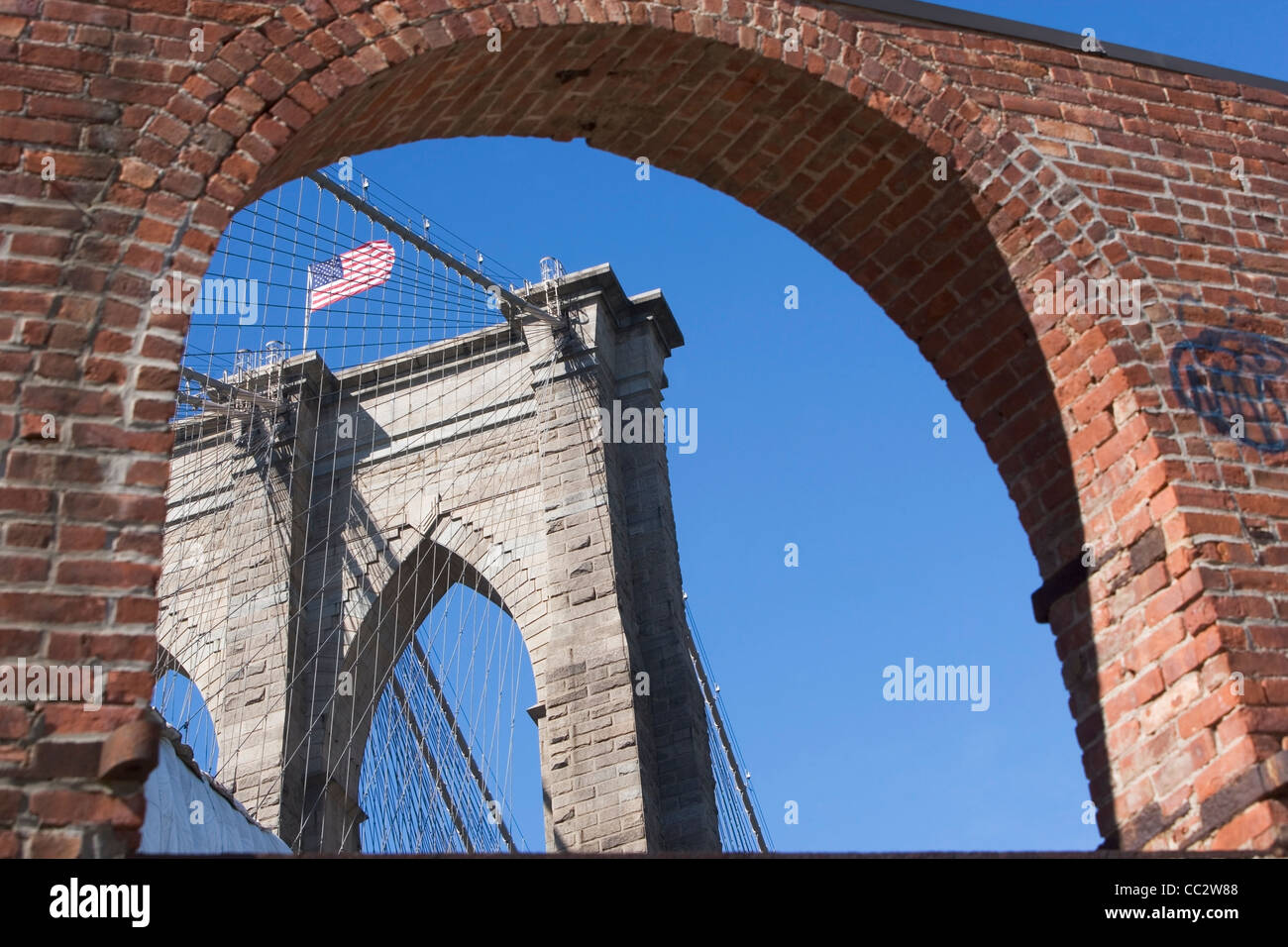 USA, New York State, New York City, Arch and Brooklyn Bridge in background Stock Photo