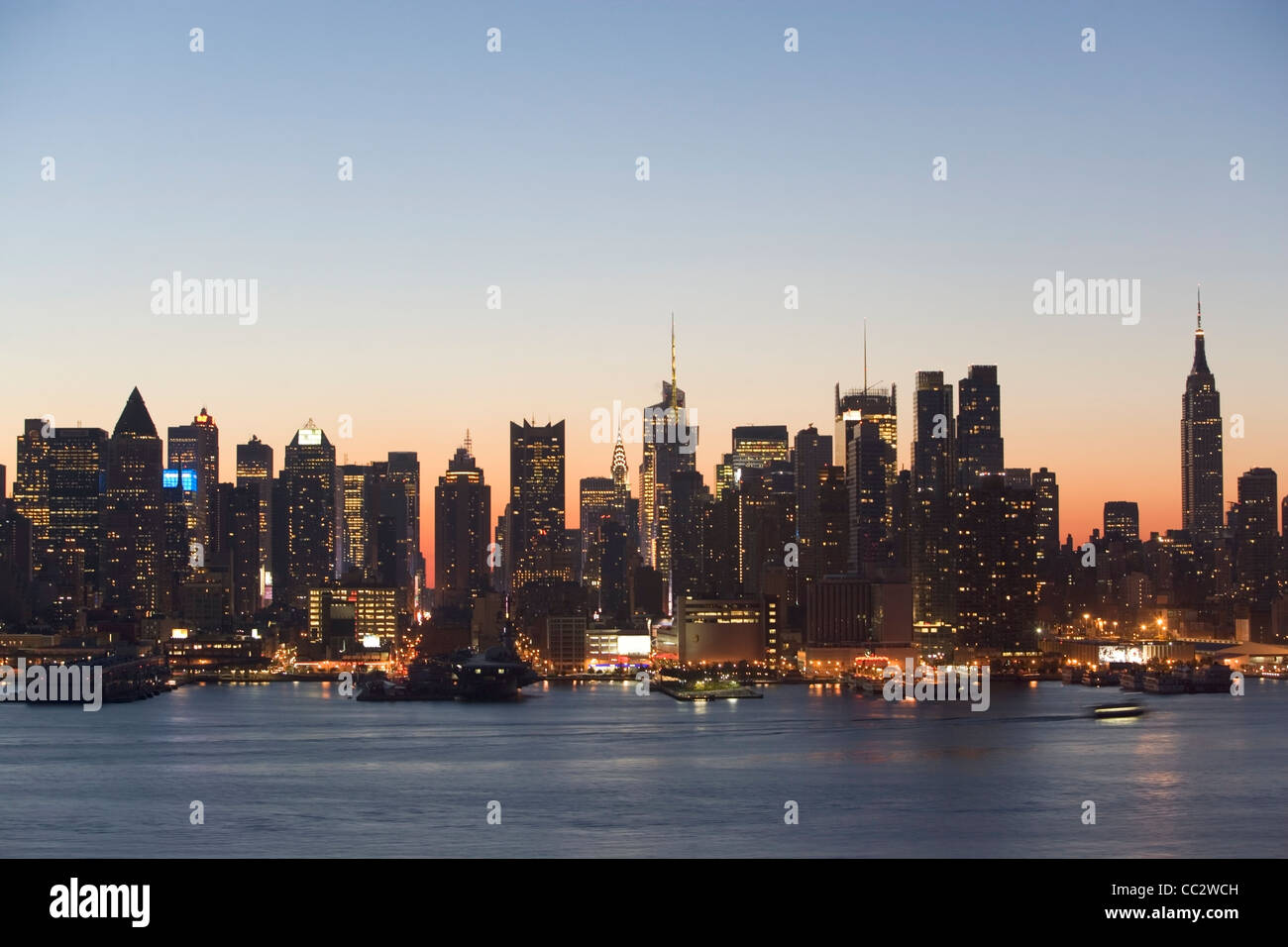 USA, New York City, Manhattan skyline at dusk Stock Photo