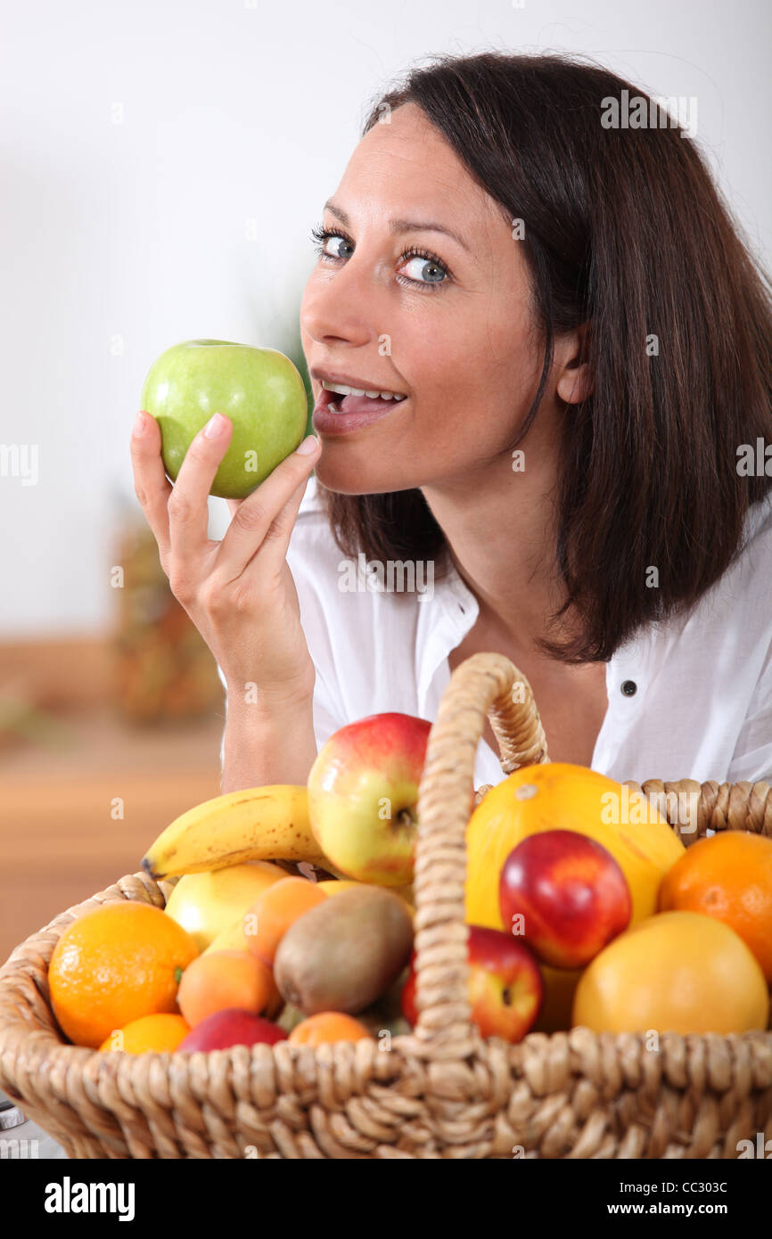portrait of a woman with fruit basket Stock Photo - Alamy