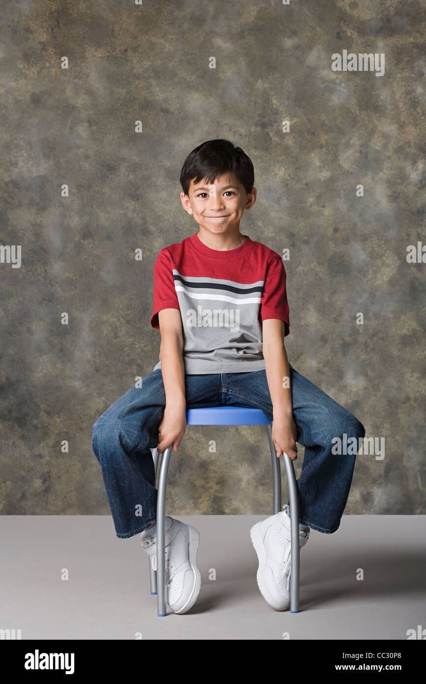 Boy stool studio hi-res stock photography and images - Alamy