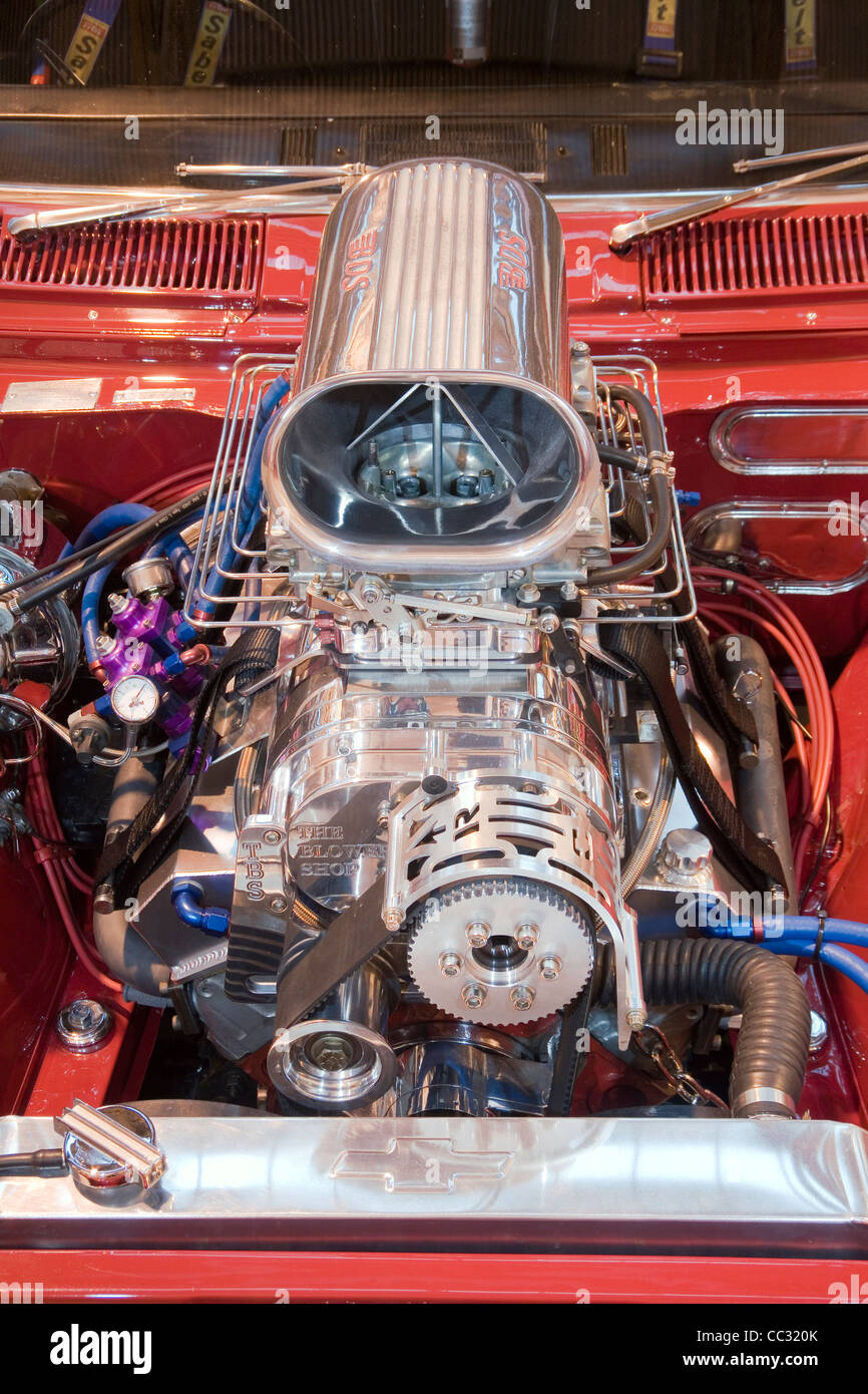 High horsepower supercharged V vee 8 eight engine motor in a modified custom car. Stock Photo