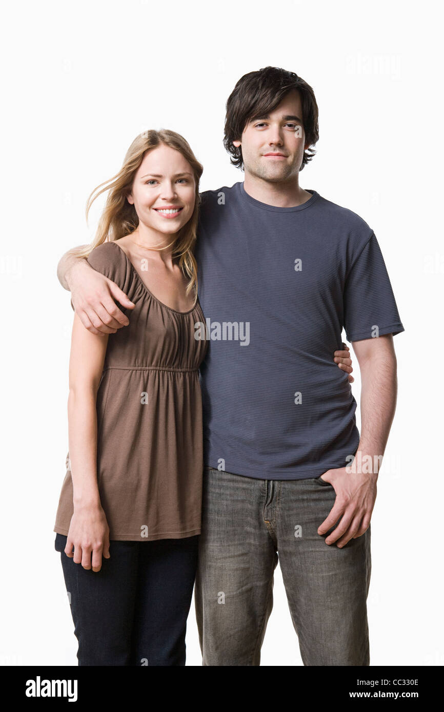 Studio portrait of young couple Stock Photo - Alamy