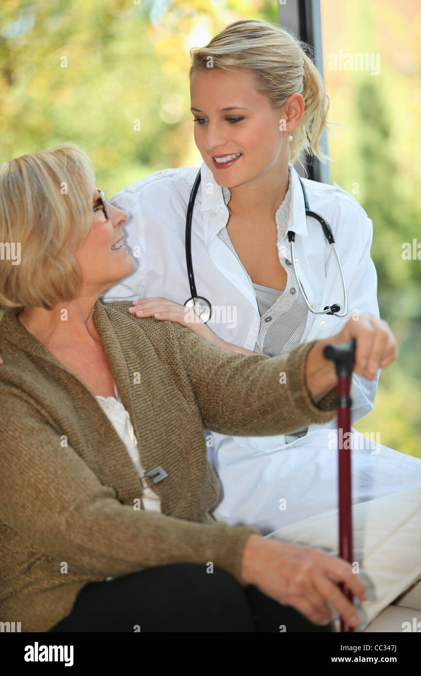 Elderly woman in a home Stock Photo Alamy