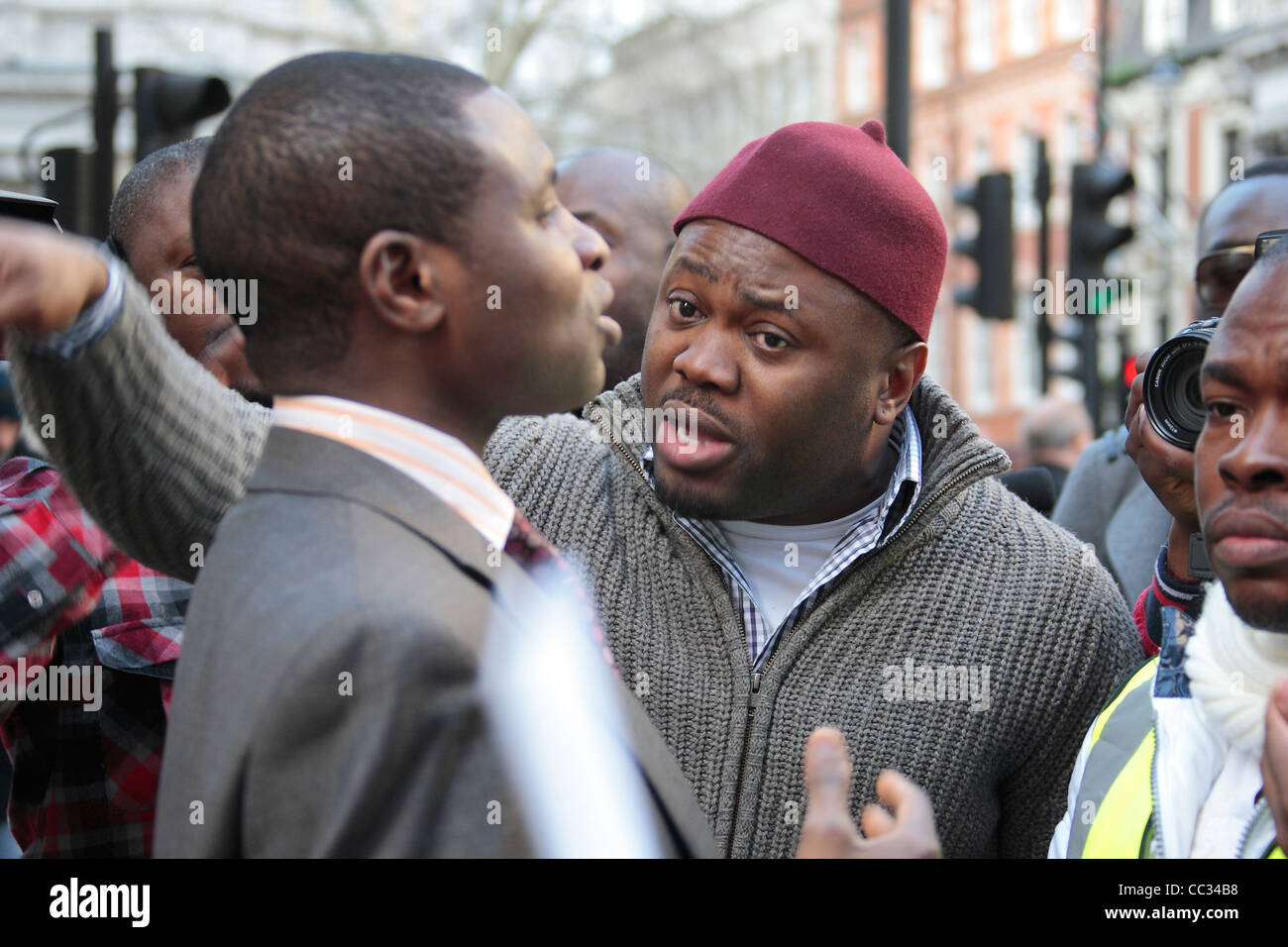 High Commission staff face Nigerian fuel subsidy protesters Stock Photo