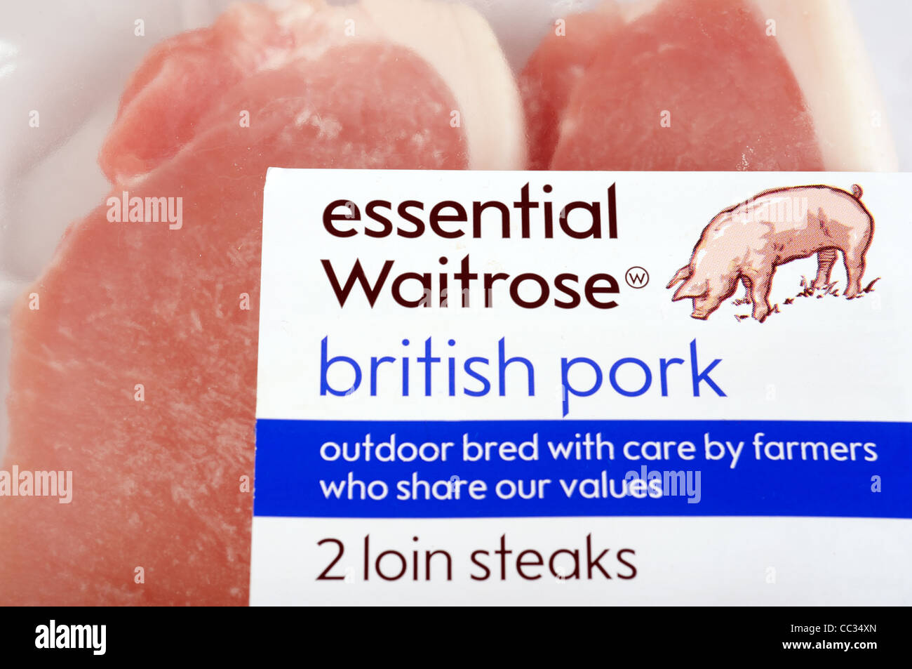 Essential Waitrose British pork loin steaks Stock Photo