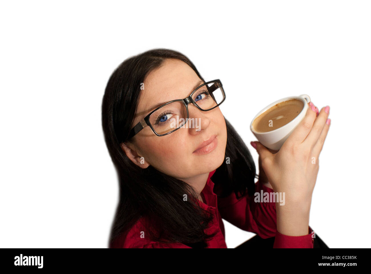 brunette girl with glasses trying to flavored coffee Stock Photo
