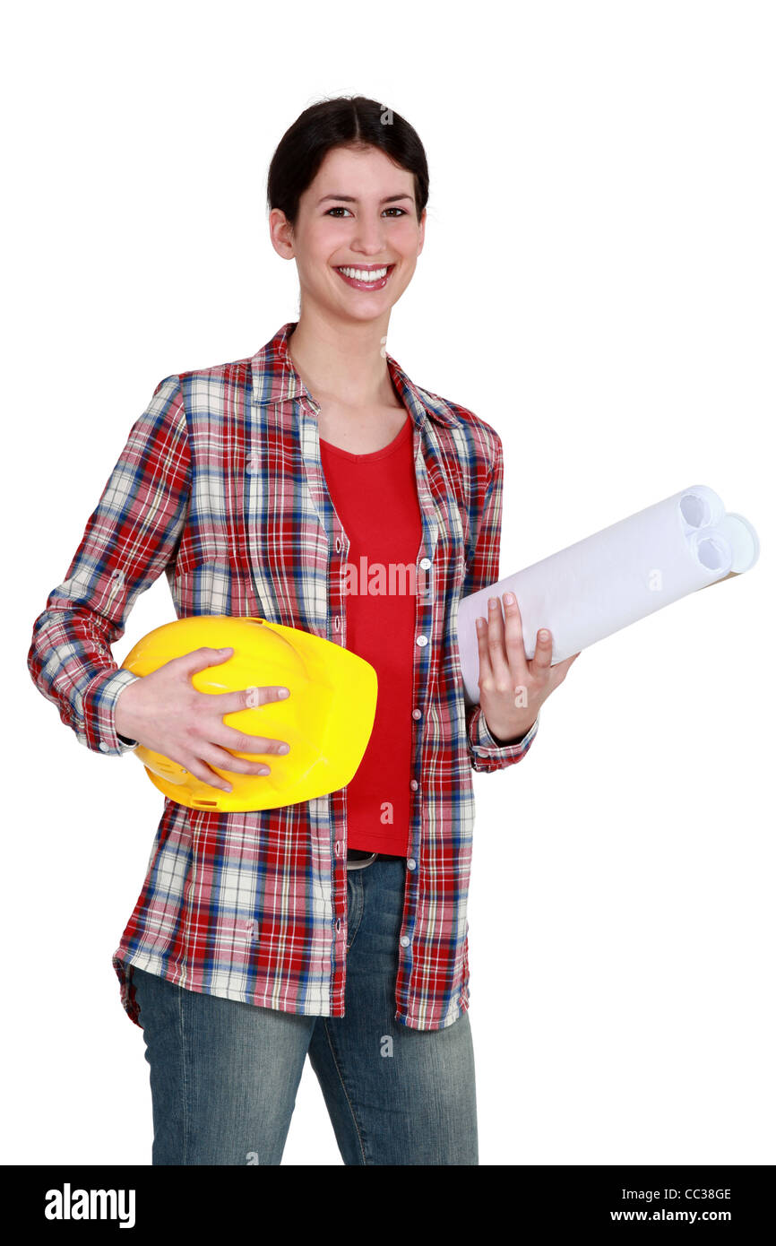 craftswoman holding a helmet and a blueprint Stock Photo - Alamy
