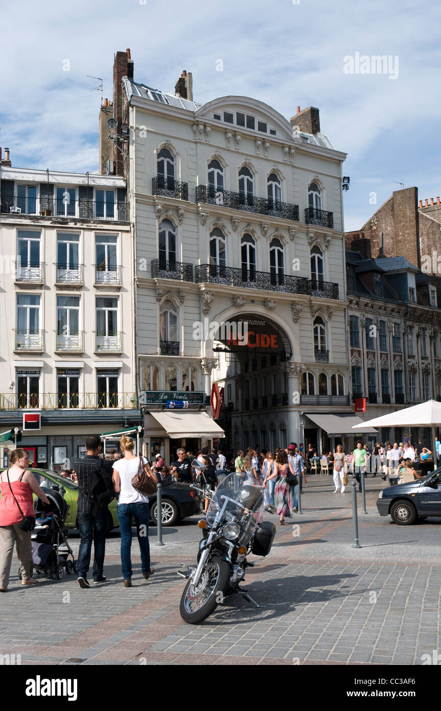 Tourists and locals pass through Place du General de Gualle  in Lille, France. Stock Photo