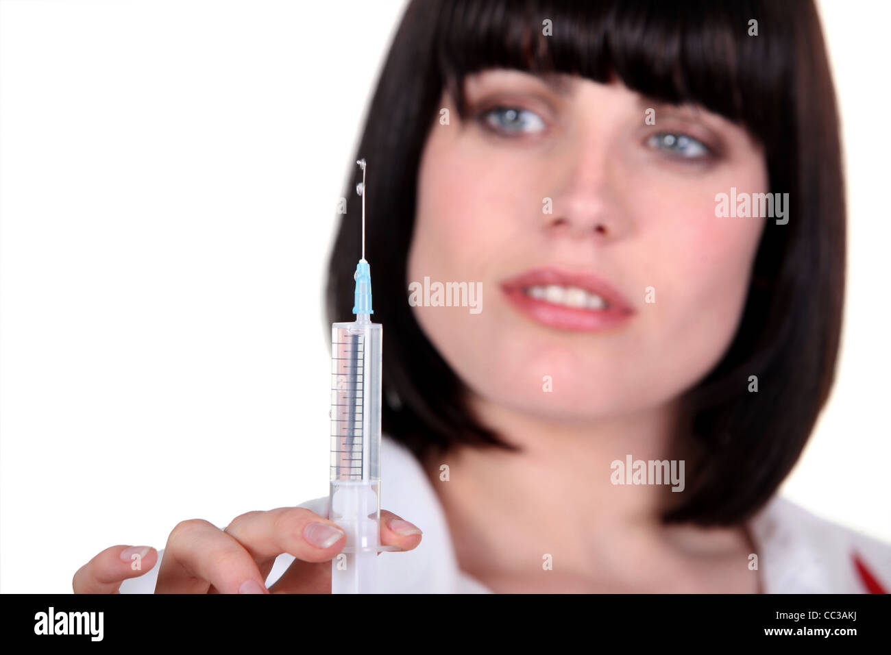 Woman with a hypodermic needle Stock Photo Alamy