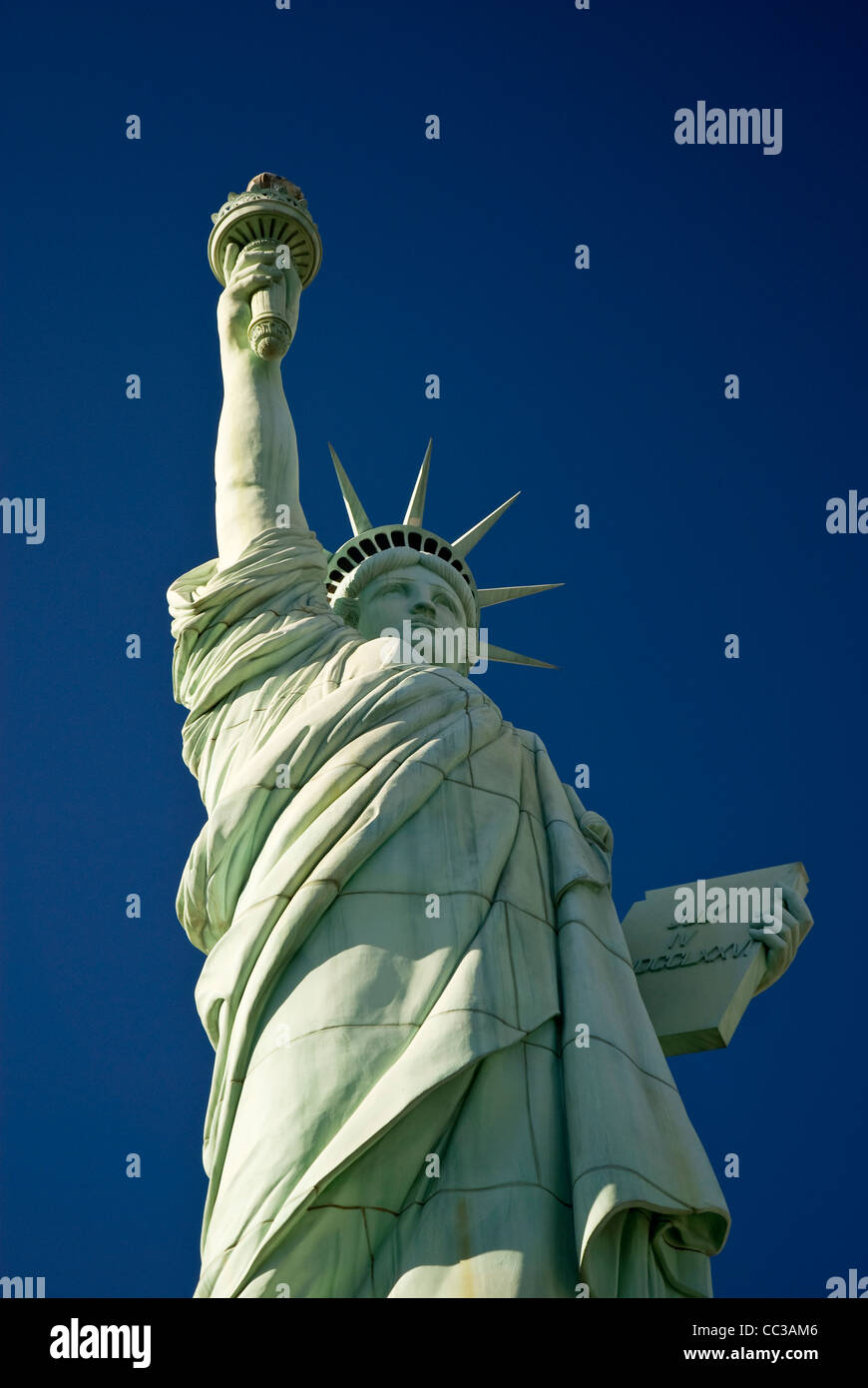 A halfsize replica of The Statue of Liberty stands outside the New
