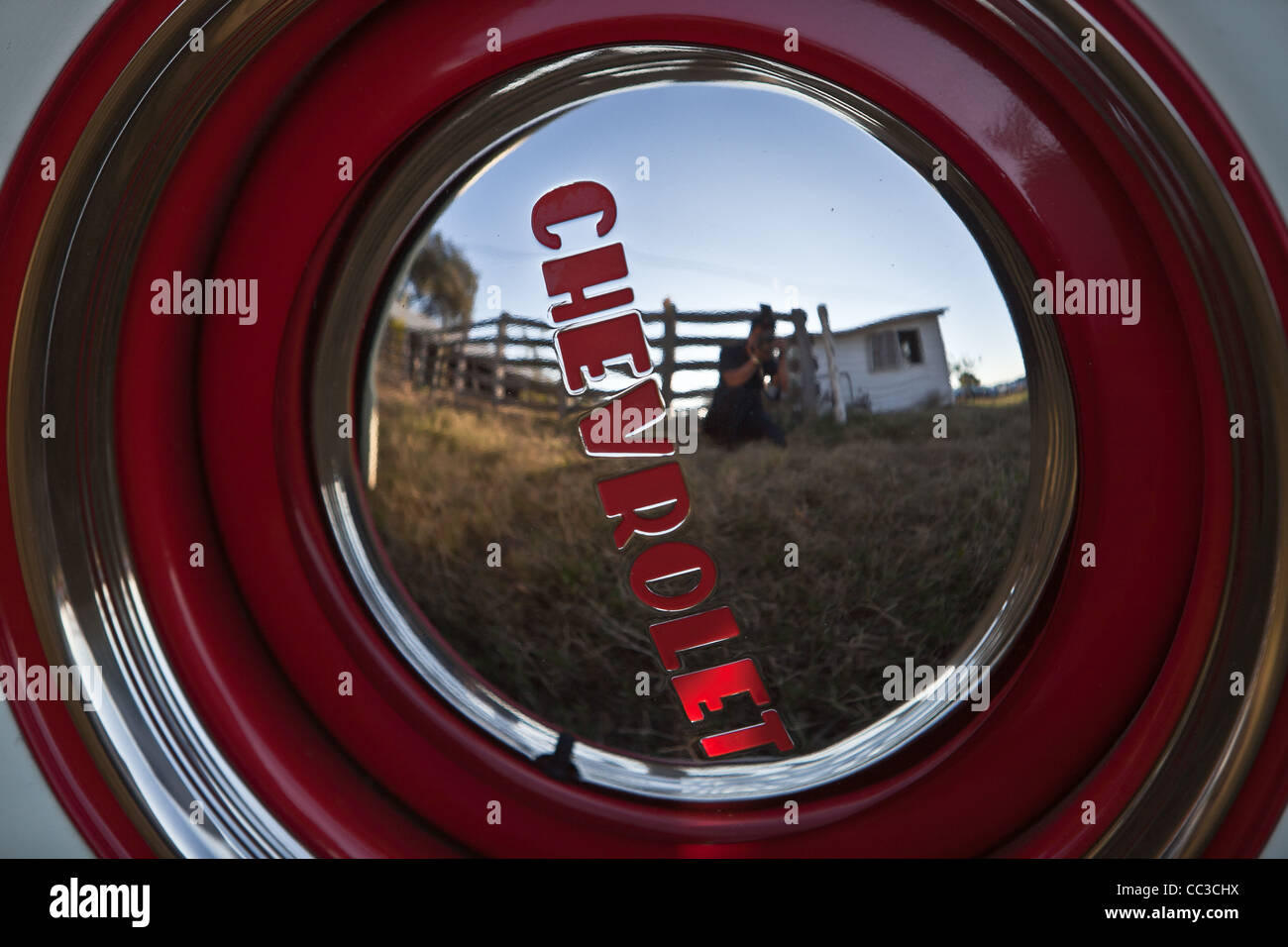 Shiny hubcap to a Chevrolet Pickup truck Stock Photo Alamy