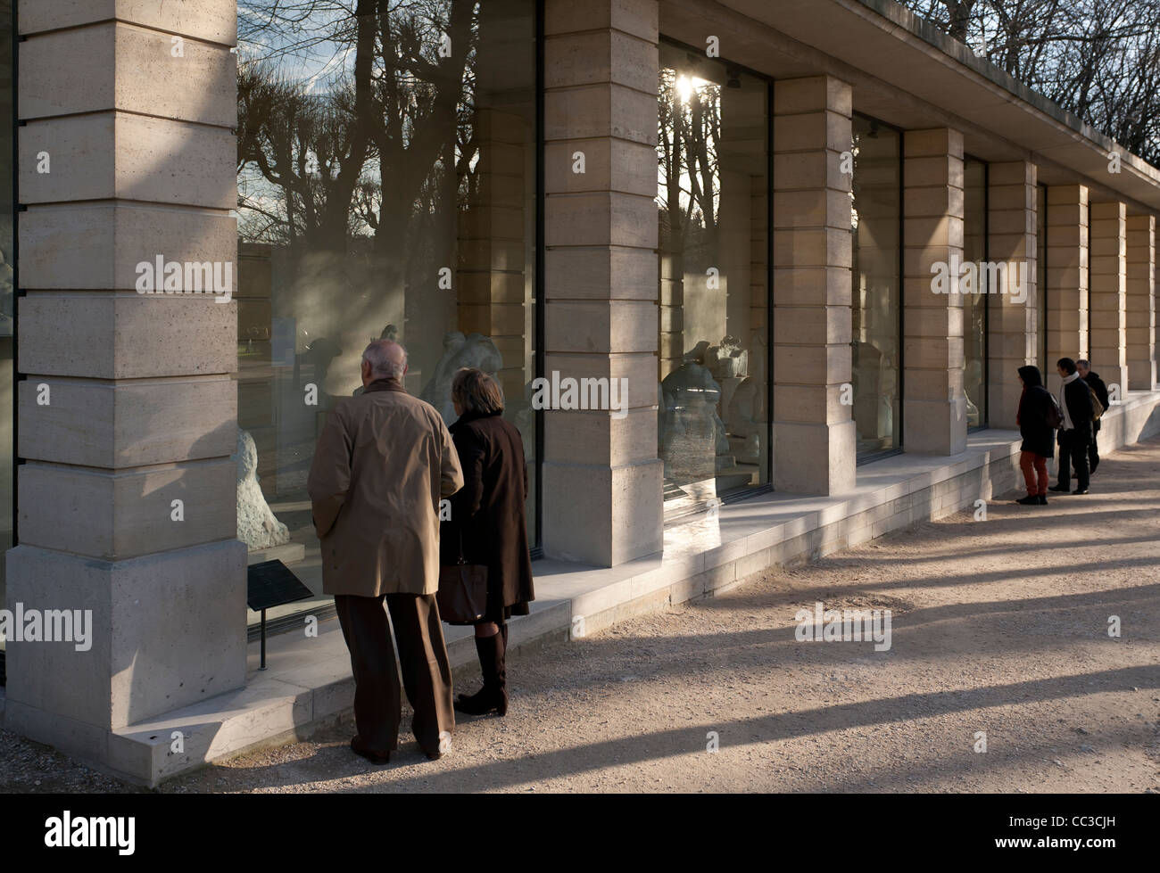 Visitors viewing exhibits in the marble gallery, Rodin Museum garden ...