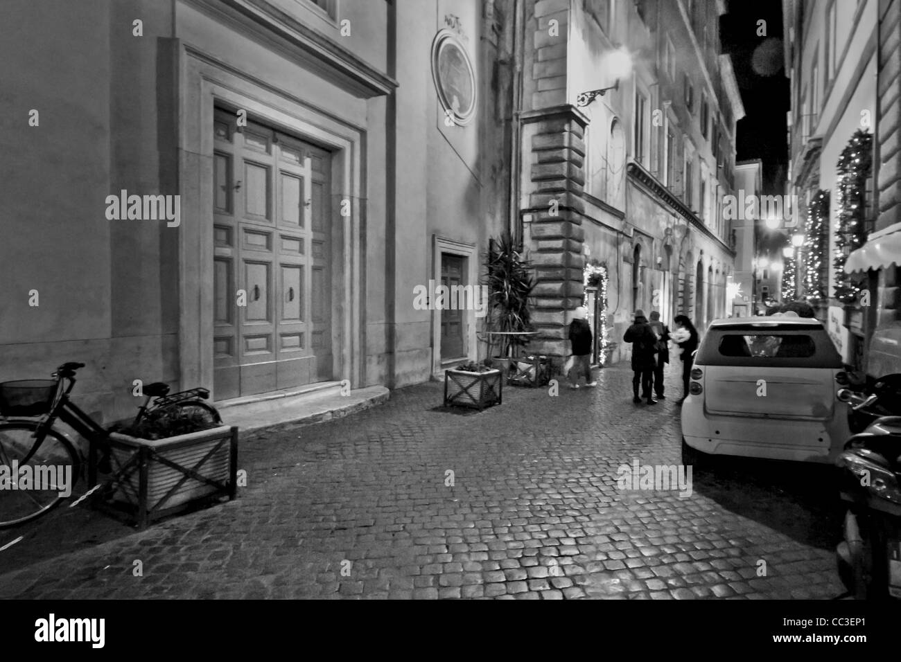 Narrow alleyway stone building Black and