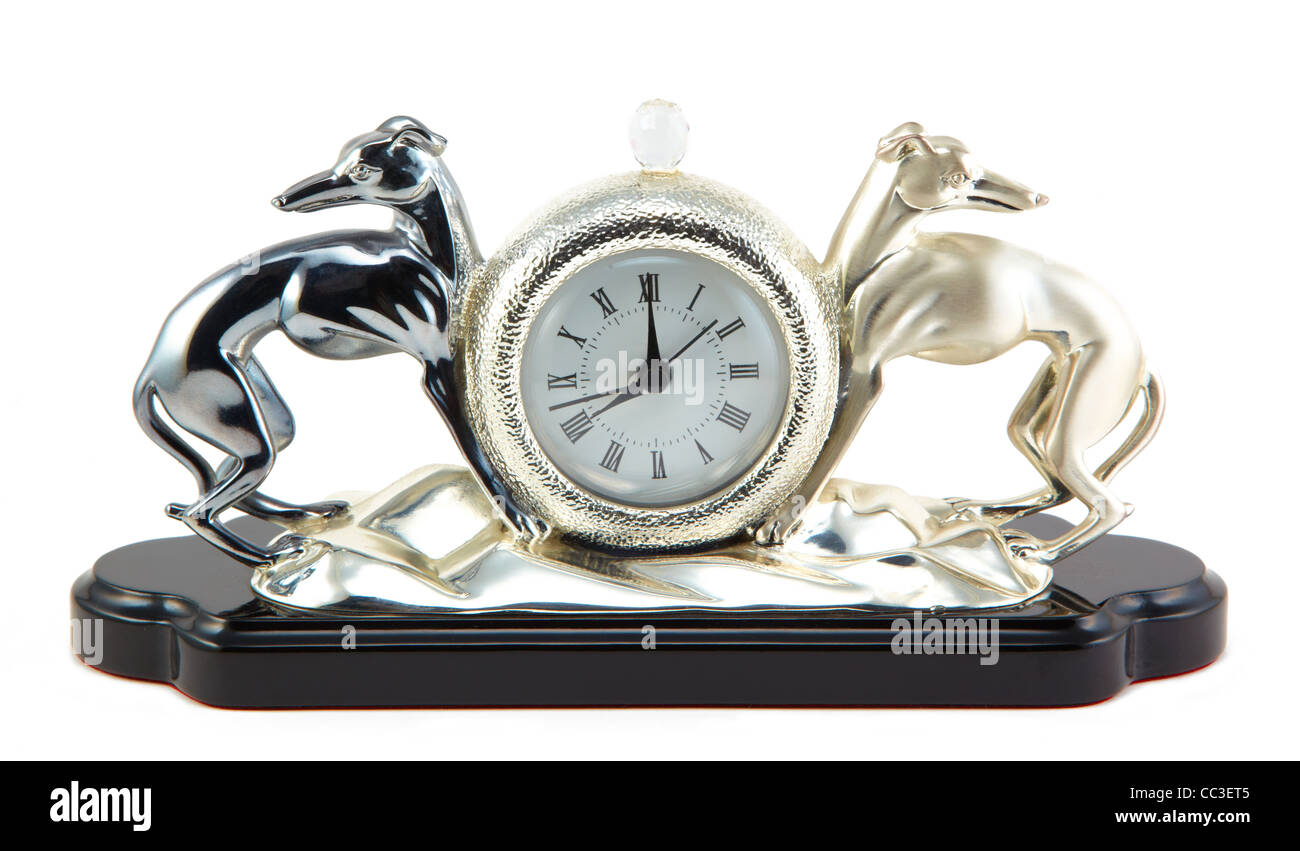 Retrostyled clock with two steel dogs figure Stock Photo Alamy