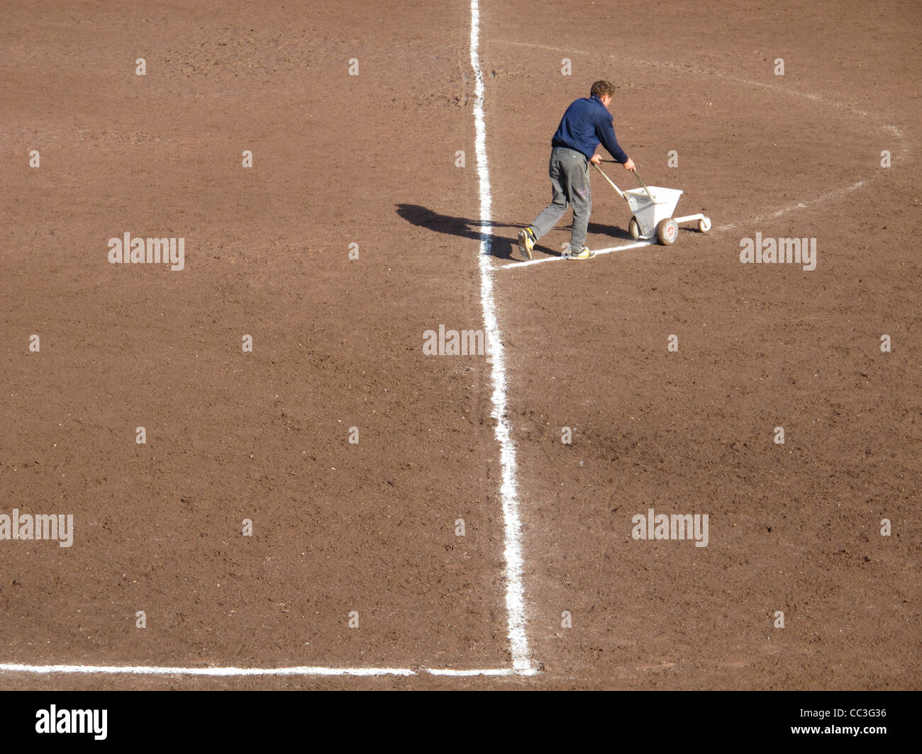 groundsman marking football pitch area Stock Photo Alamy