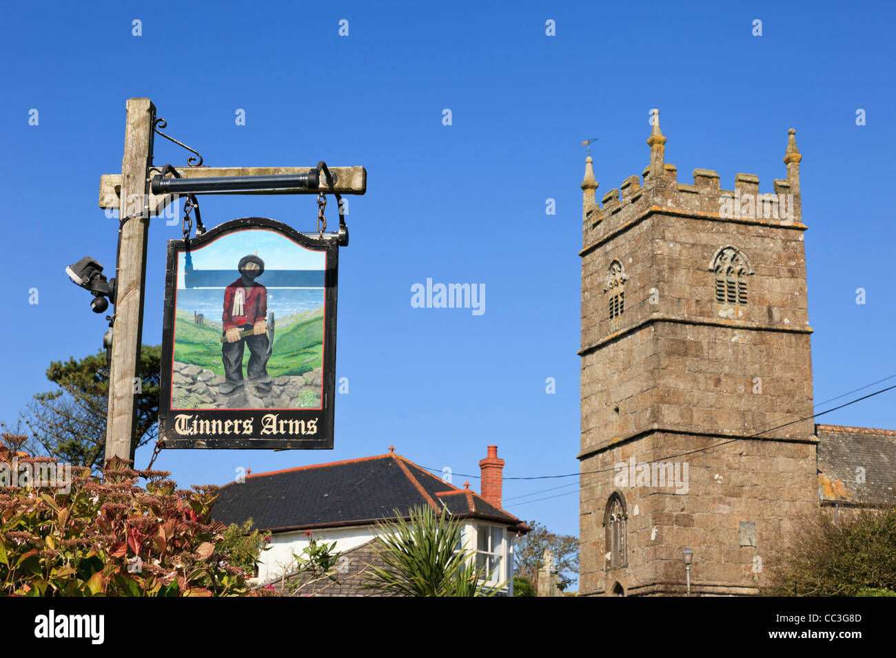 Zennor Cornwall England UK Britain. Tinners Arms village pub sign and St Senara church tower Stock Photo