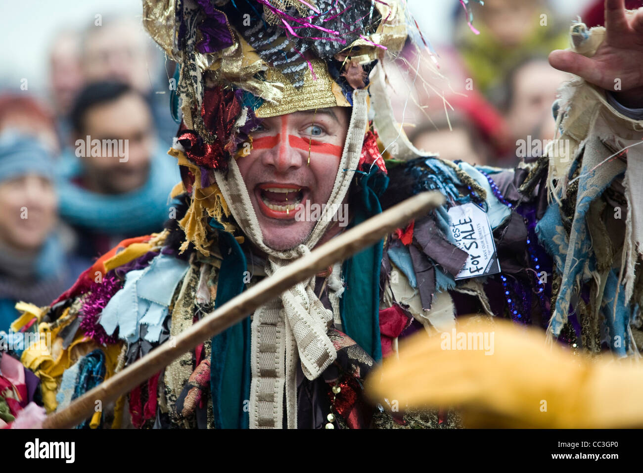 An actor dressed as St George fights in a traditional play celebrating a 'wassail' to herald the new year. Stock Photo