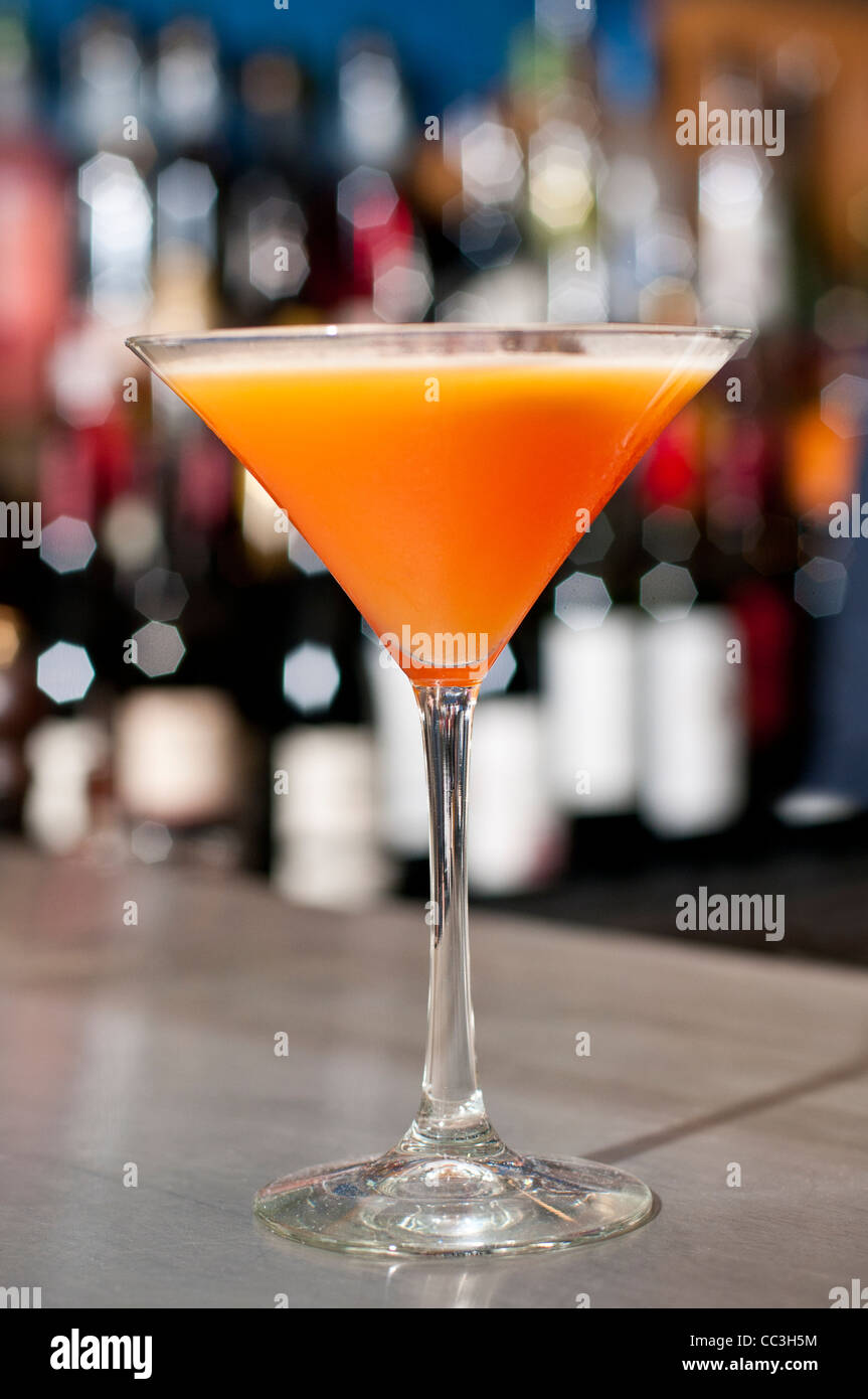 An orange coloured cocktail Stock Photo