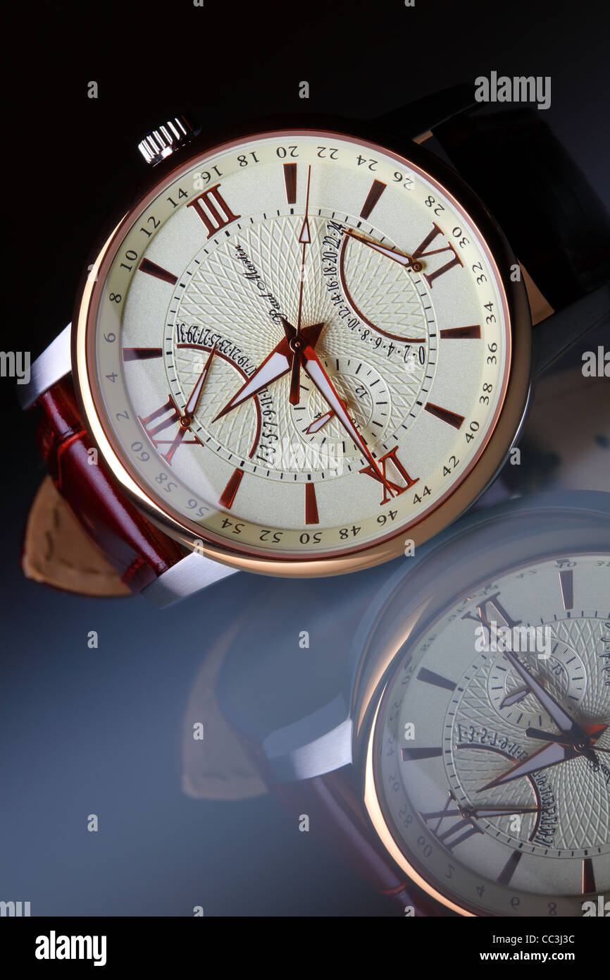 Swiss luxury watch with reflection still life. Stock Photo