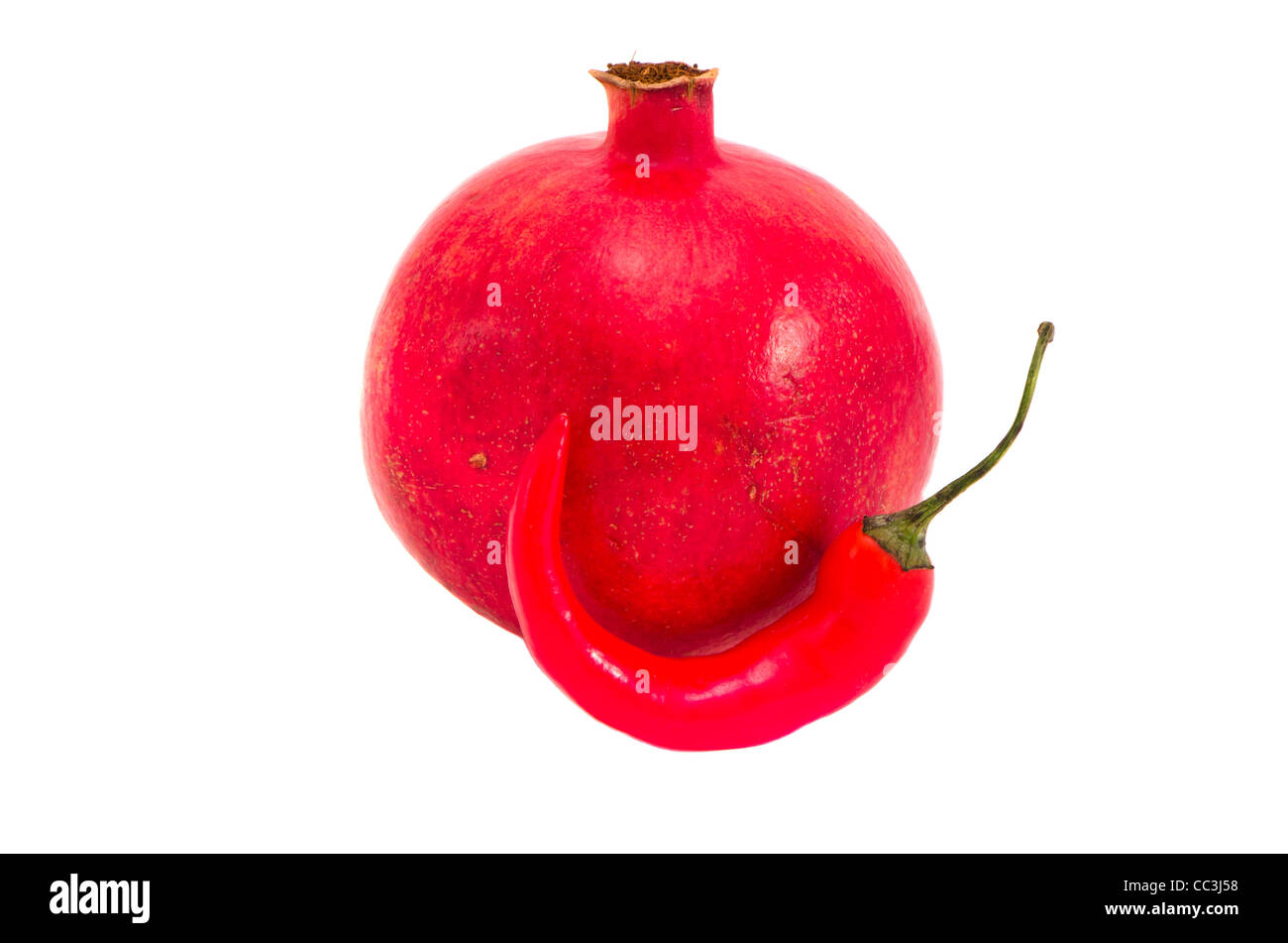 isolated on white pomegranate and red pepper Stock Photo