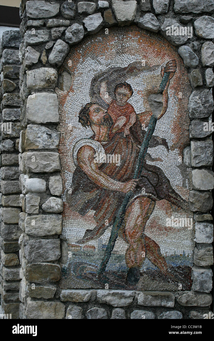 A decorative mosaic showing a Romanesque scene integrated in the walls of an Italian residence. Spilimbergo, Italy. Stock Photo