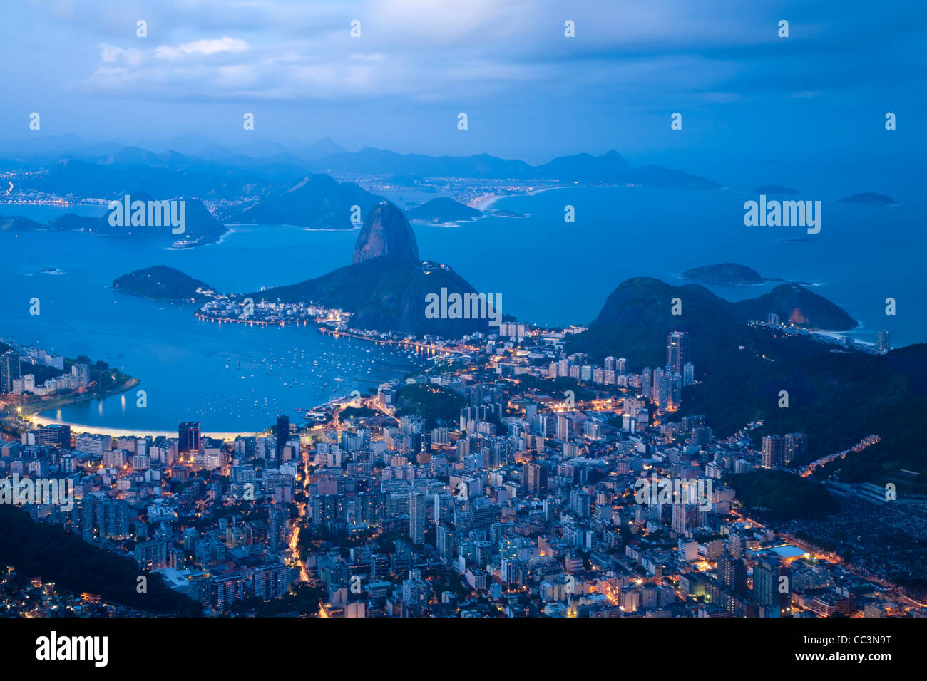 Brazil, Rio De Janeiro, Cosme Velho, View of Sugar Loaf mountain and Botafogo Bay from Cocovado at night Stock Photo