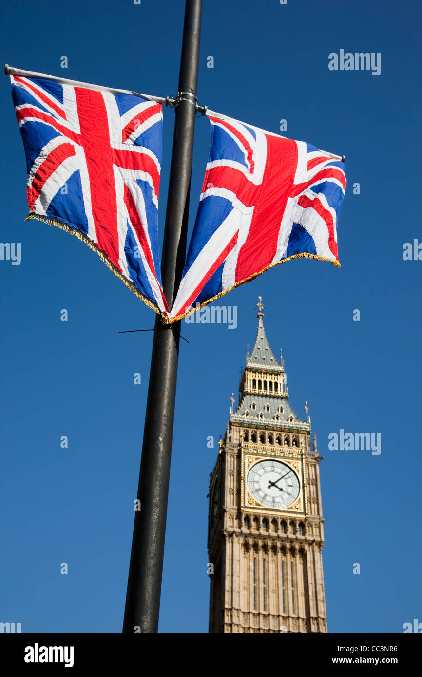 Union Jacks flying in front of Big Ben, London, England, UK Stock Photo