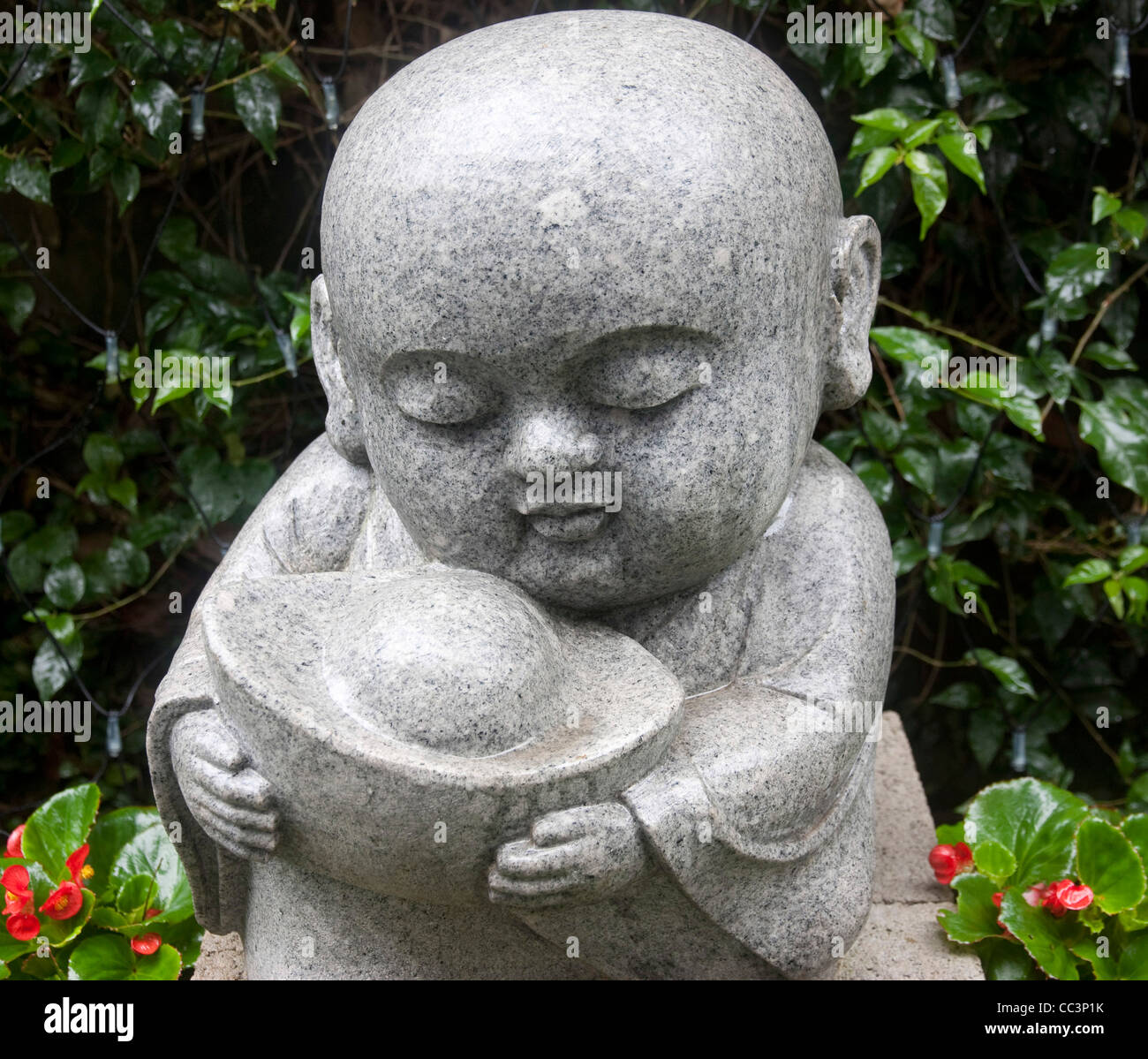 Little buddha cute mischievous hi-res stock photography and images - Alamy