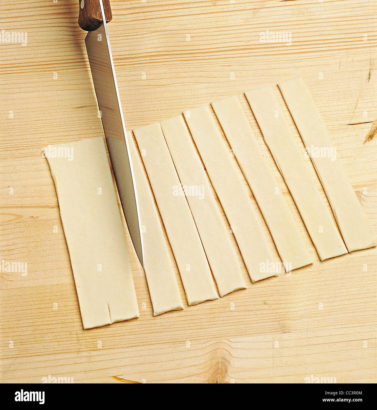 Kitchen Tools Using The Cone Of Pasta For Handset 1 Stock Photo - Alamy