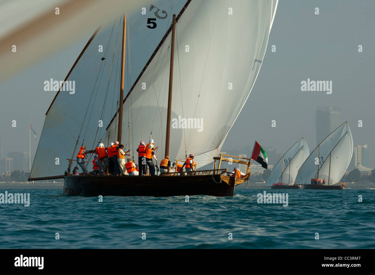 Traditional sailing Dhows Racing in Abu Dhabi, United Arab Emirates Stock Photo