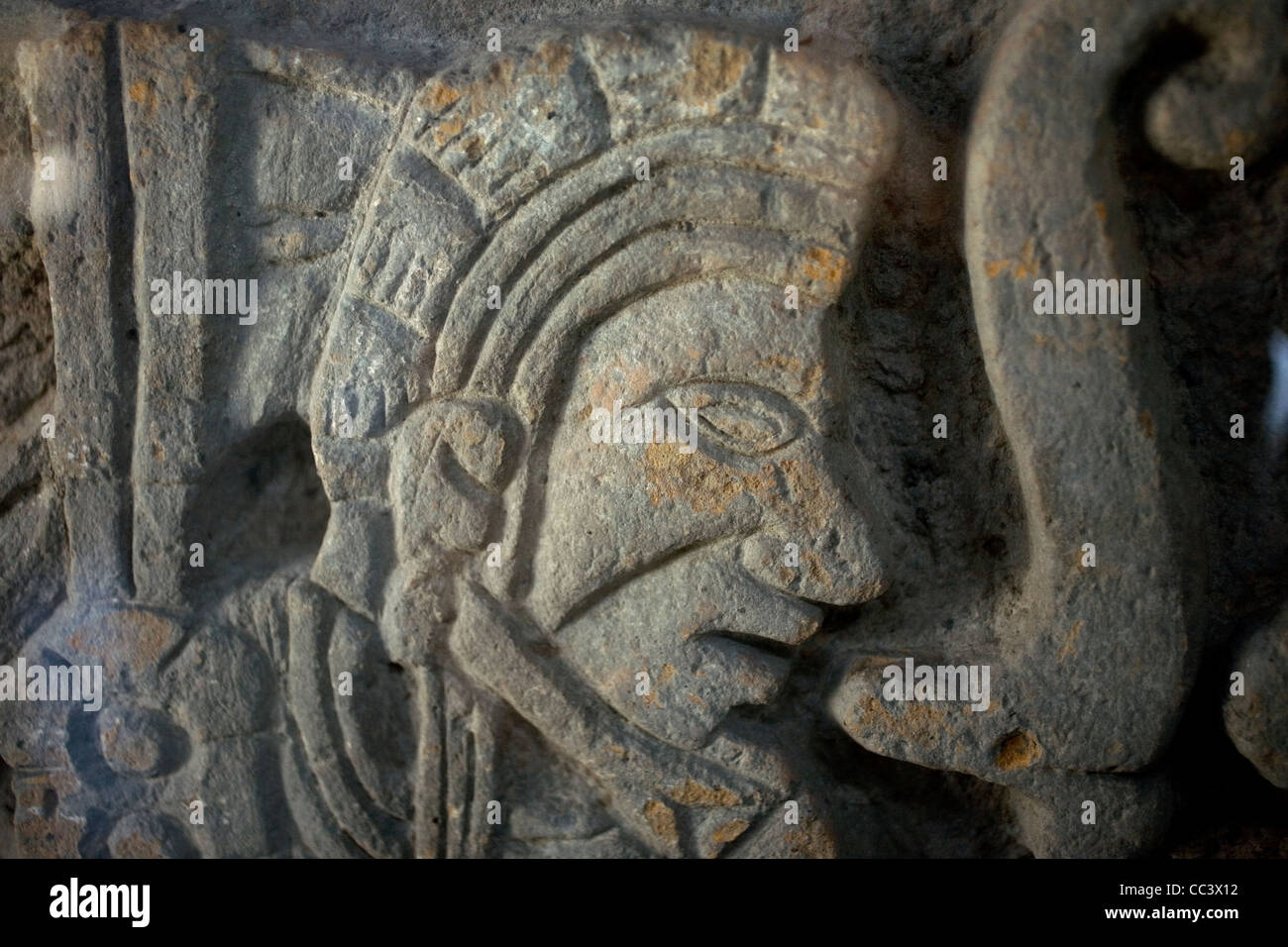An sculpture of a warrior decorates the Coatepantli or snakes wall at the archeological site of Tula, Mexico, Sunday, Nov. 20, 2 Stock Photo