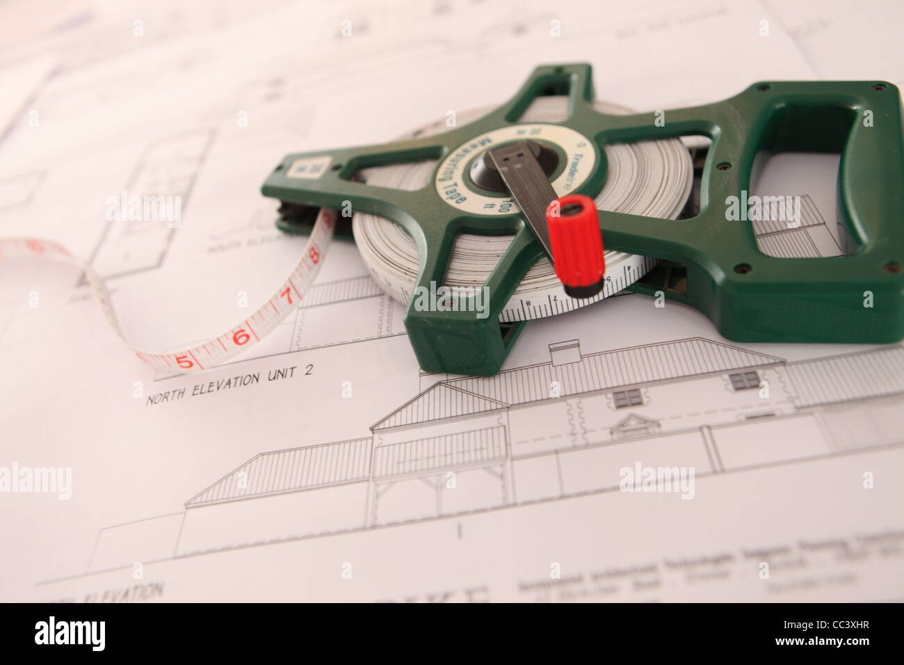 ARCHITECTS DRAWING WITH TAPE MEASURE Stock Photo Alamy