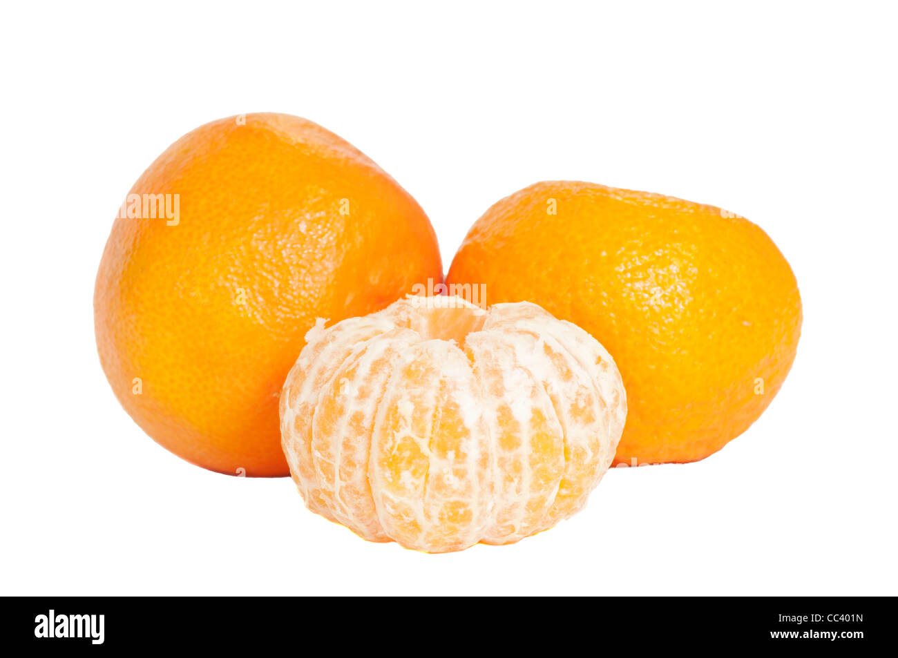 Fresh Satsumas Oranges Peeled and Unpeeled ( Focus On The Peeled Satsuma) Vitamin C Stock Photo