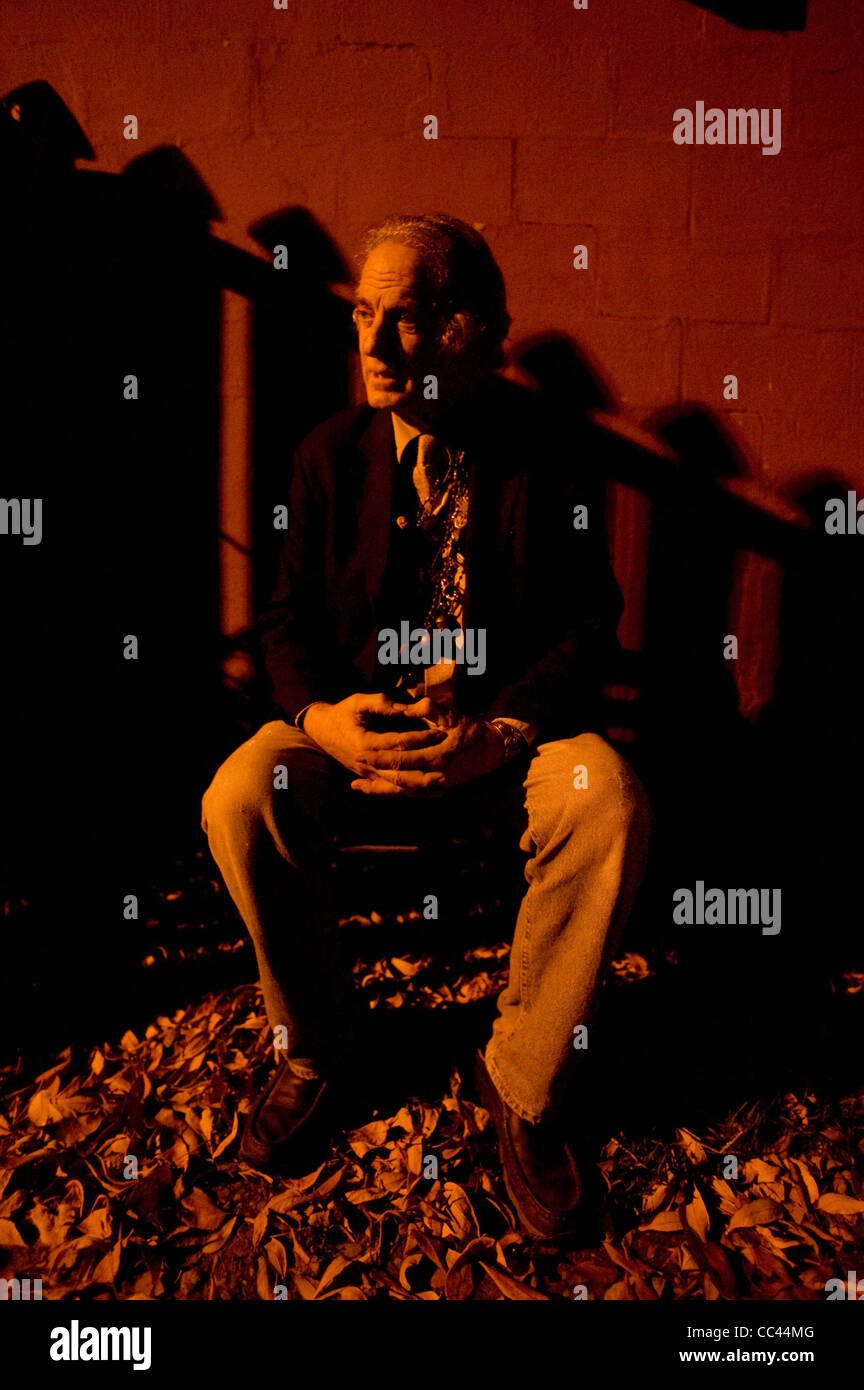 Musician David Amram sitting for a portrait outside the Rudyard Kipling