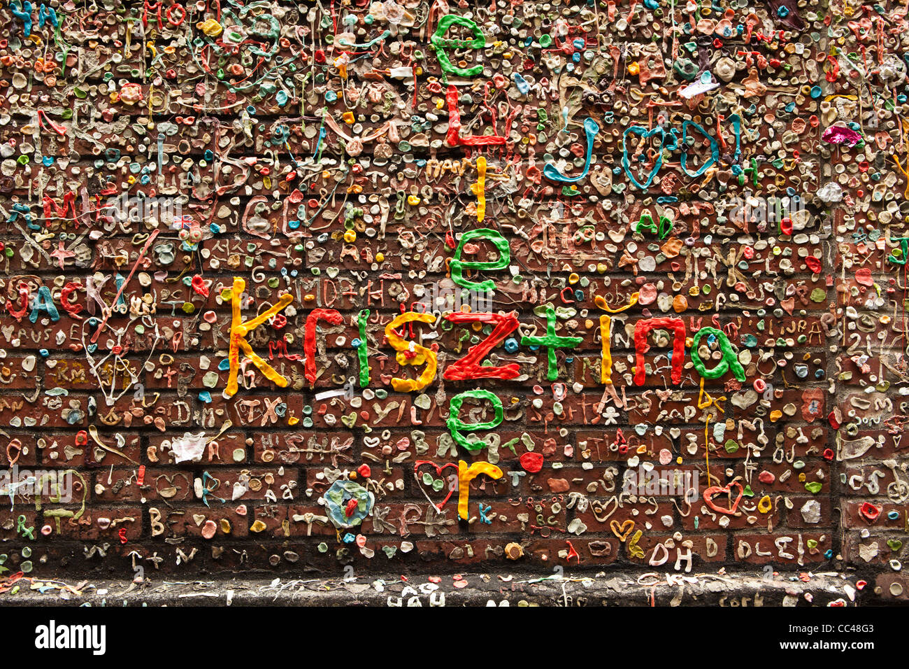 Gum Wall at Pike's Place Market in Seattle, WA. 1980's the owner of the Market Theatre asked people to get rid of their gum. Stock Photo