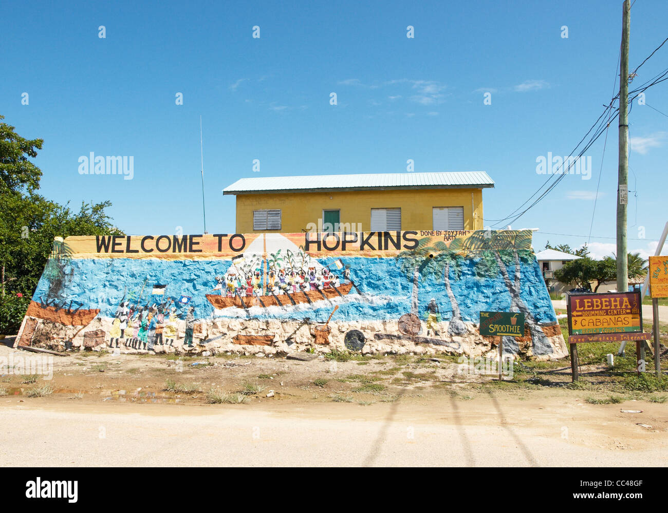 Painted welcome to Hopkins village in the Stann Creek district of Belize. EDITORIAL USE ONLY Stock Photo