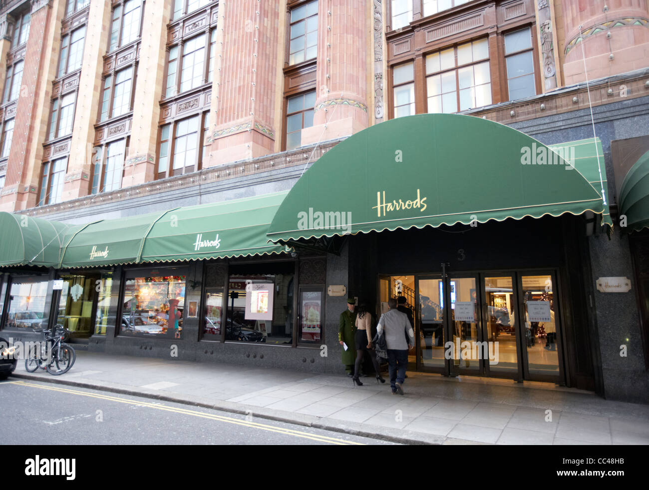 Harrods store entrance and doorman knightsbridge London England UK