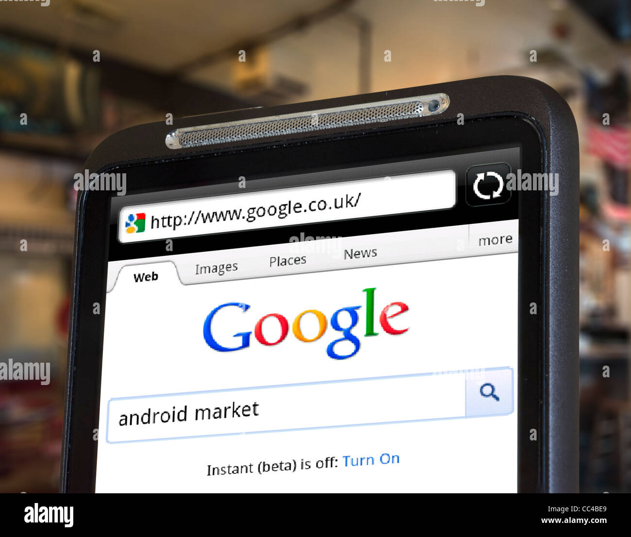 Performing a Google search on an HTC smartphone Stock Photo