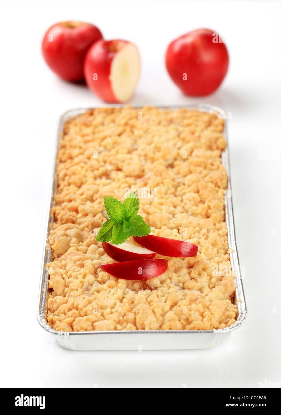 Apple crumble in aluminum foil container Stock Photo Alamy