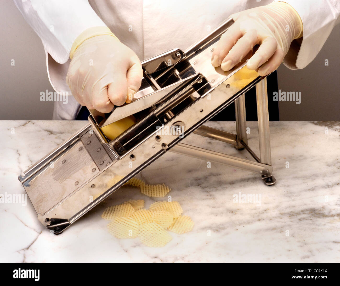 Cuisine Mandolin. Tool To Cut The Vegetables Into Different Formats Stock Photo Alamy