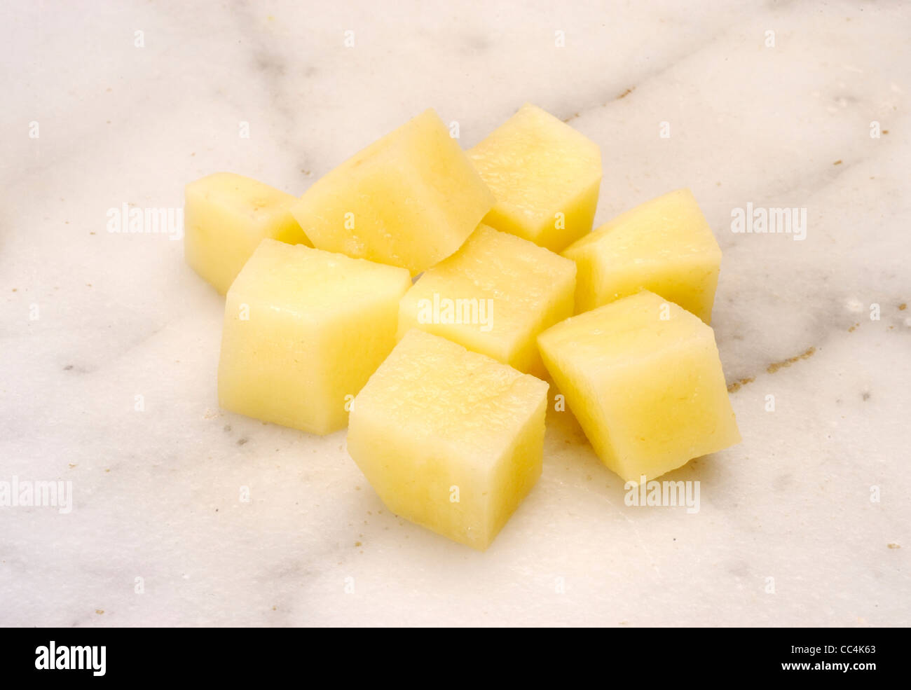 Kitchen Cut Potatoes Into Cubes. Potatoes Rissolees Stock Photo Alamy