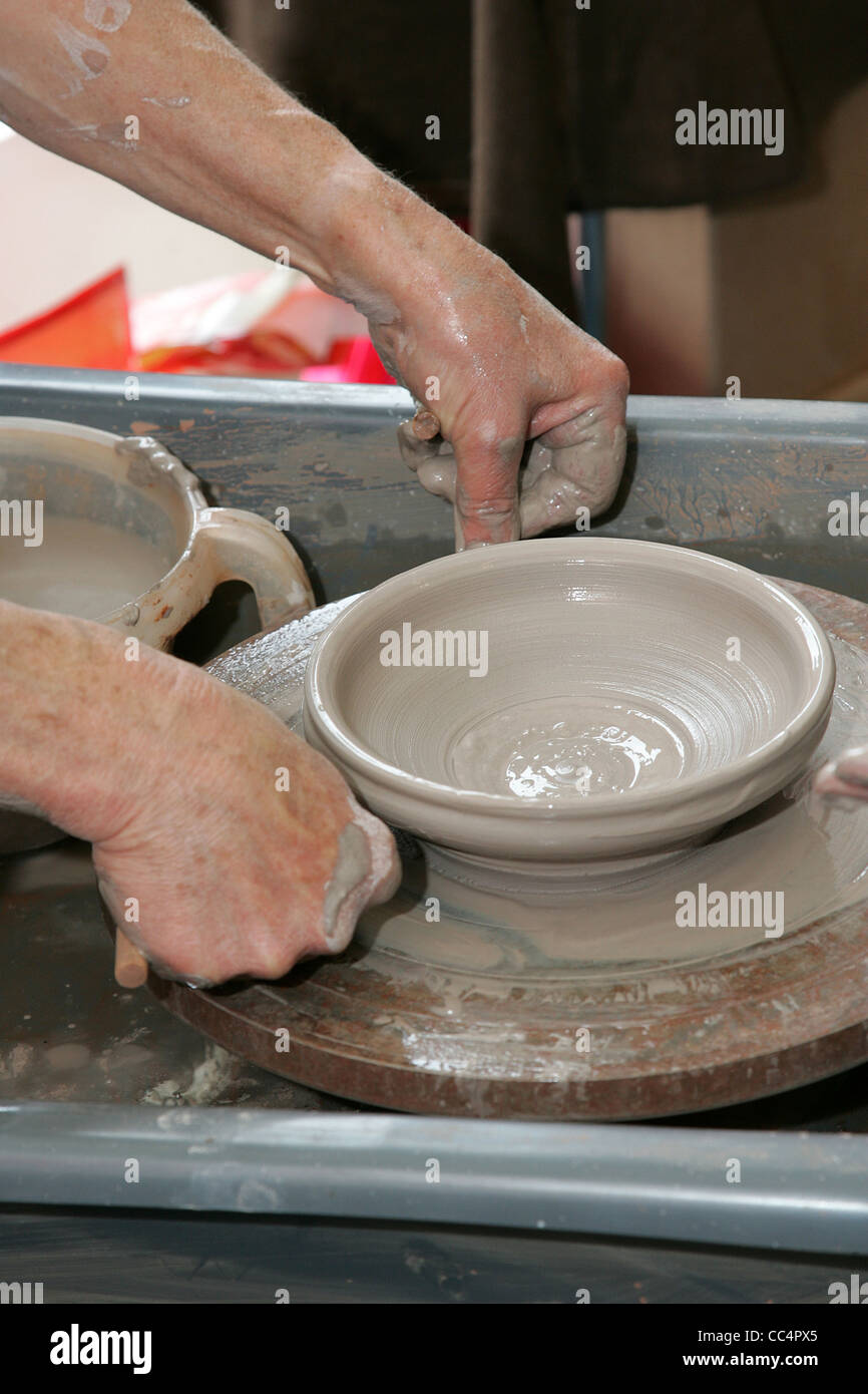 Making A Bowl On Potters Wheel Stock Photo Alamy