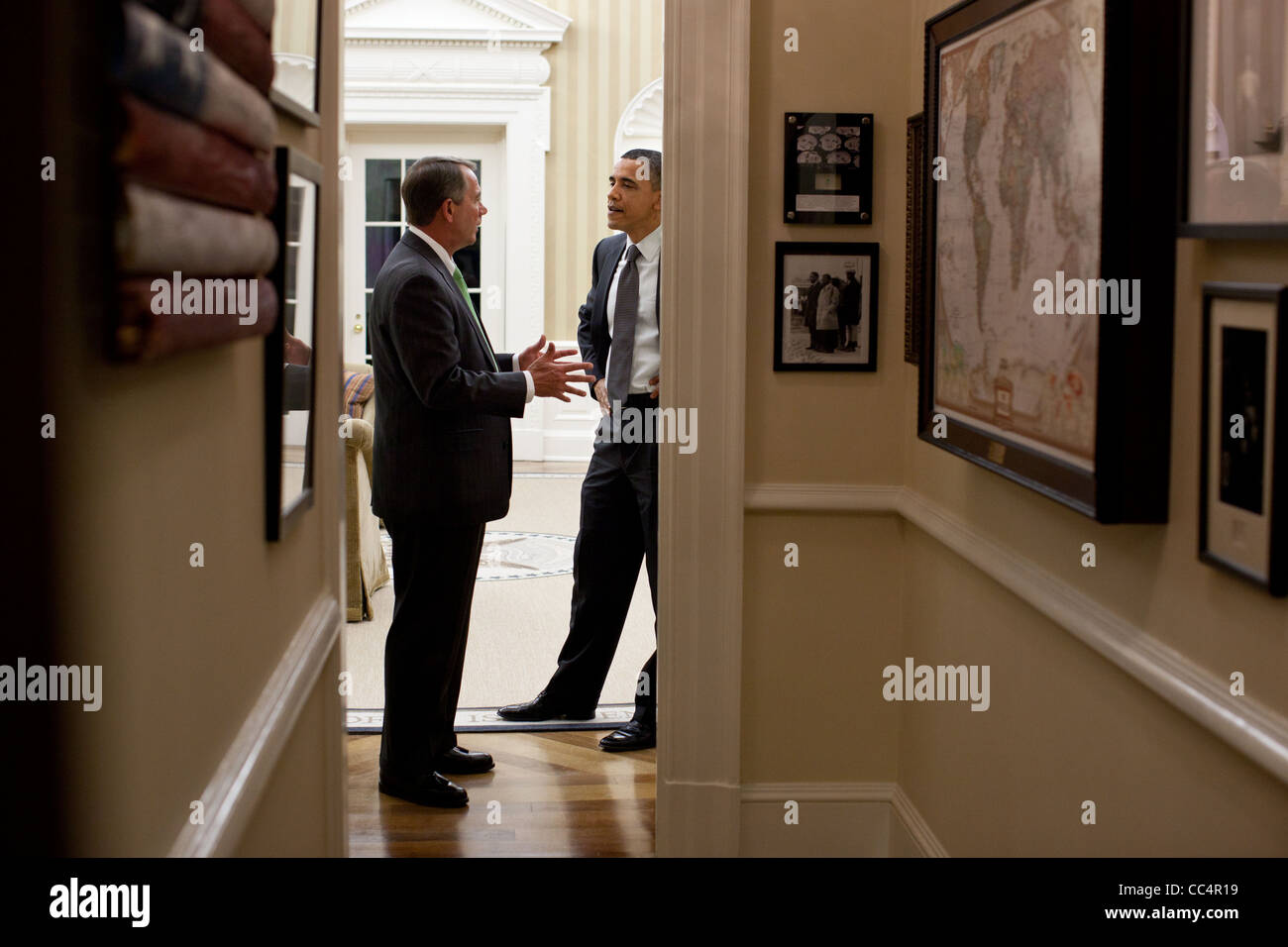 President Obama speaking with House Speaker John Boehner in the Oval Office. Stock Photo