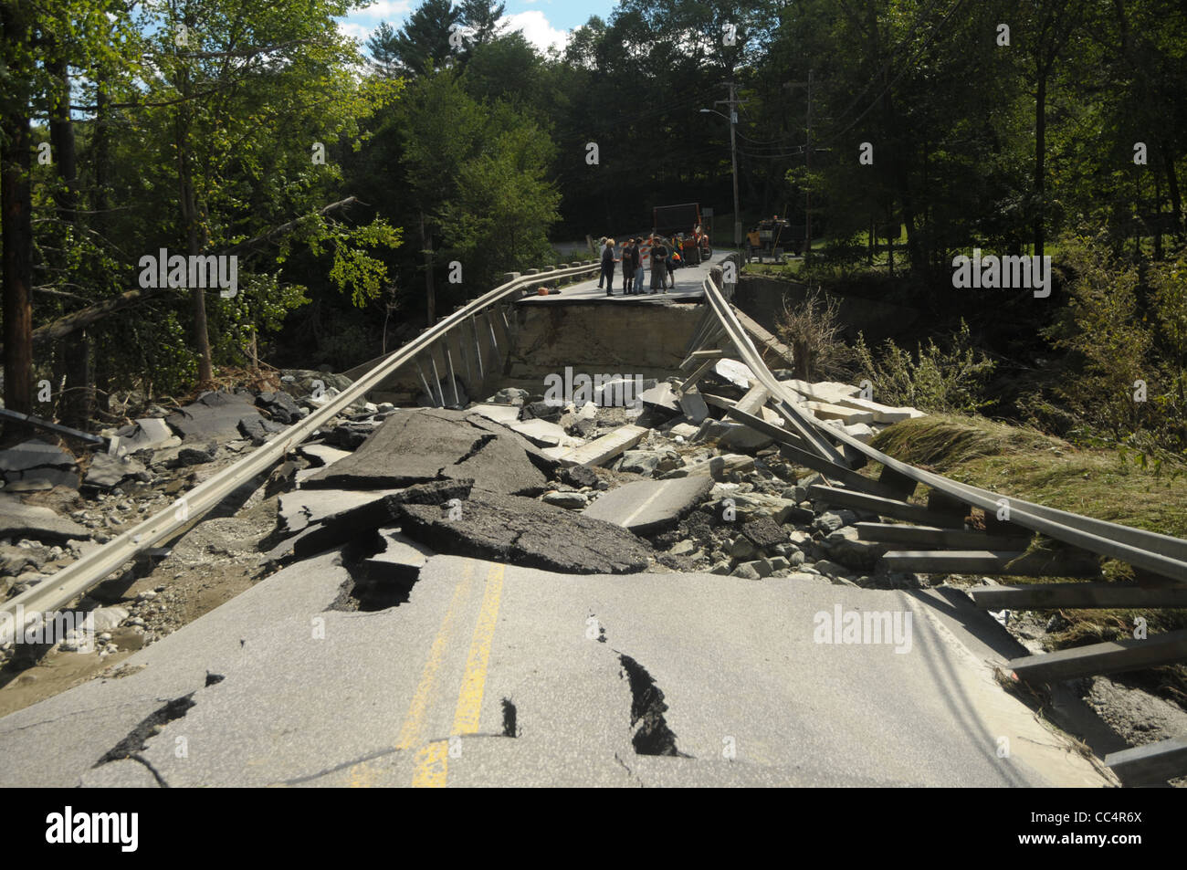 The road surface crumpled by tropical storm Irene shows the damage