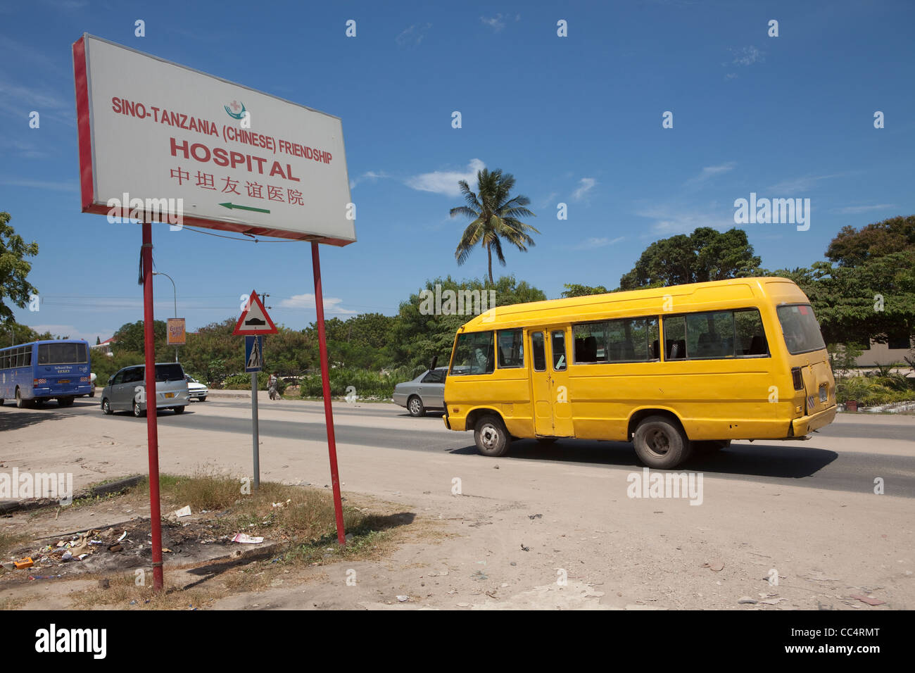A Chinese-run hospital in Tanzania sits along a busy street in Dar es Salaam. Stock Photo