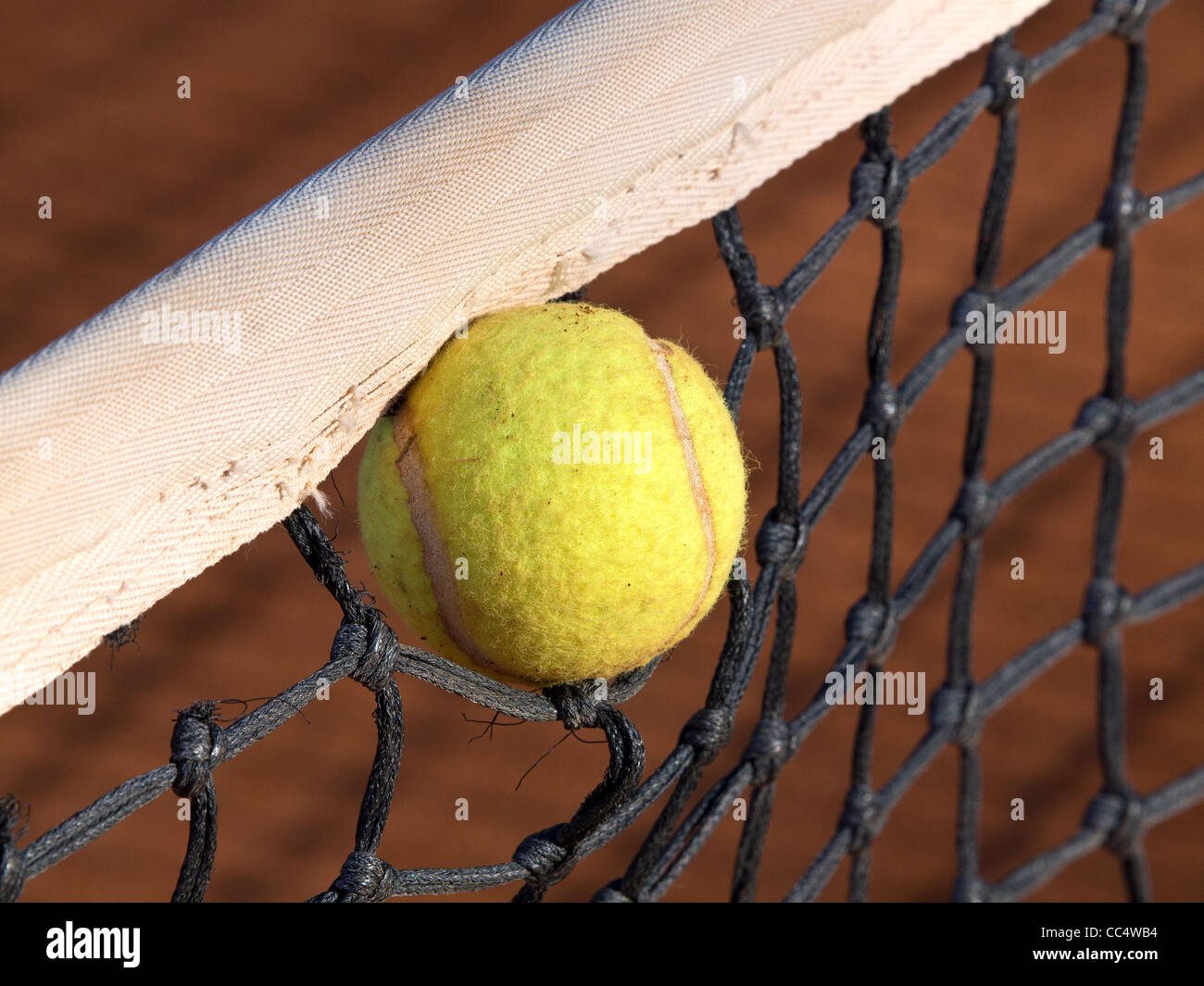 tennis ball stack in the net Stock Photo