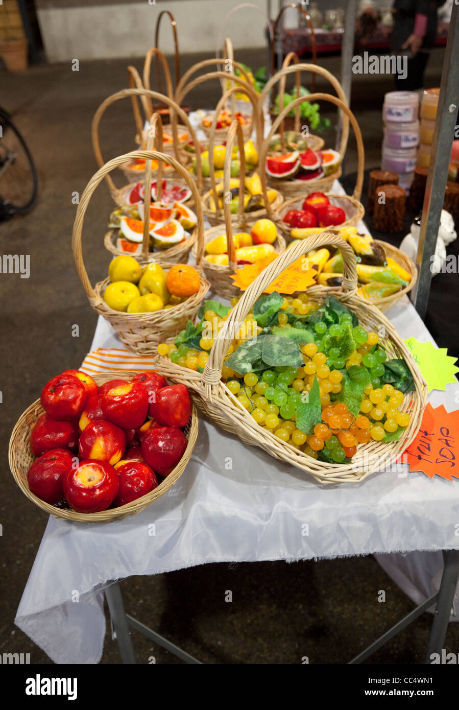 A table with fruit baskets for sale, Spitalfields Market, London, England,  UK Stock Photo - Alamy