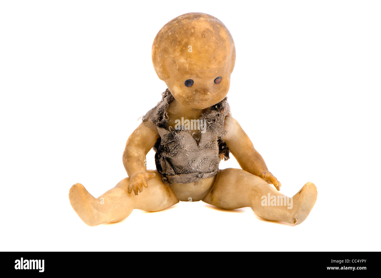 isolated grungy old and refuse doll hobo Stock Photo