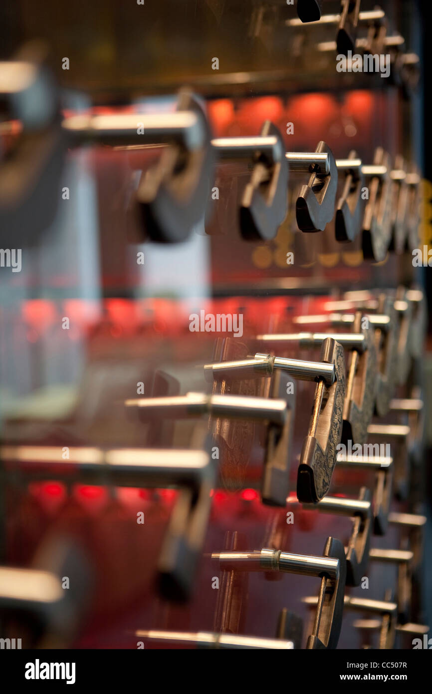 Varied locks on the glass door, Xiu Bar, Yintai Center, Beijing, China Stock Photo